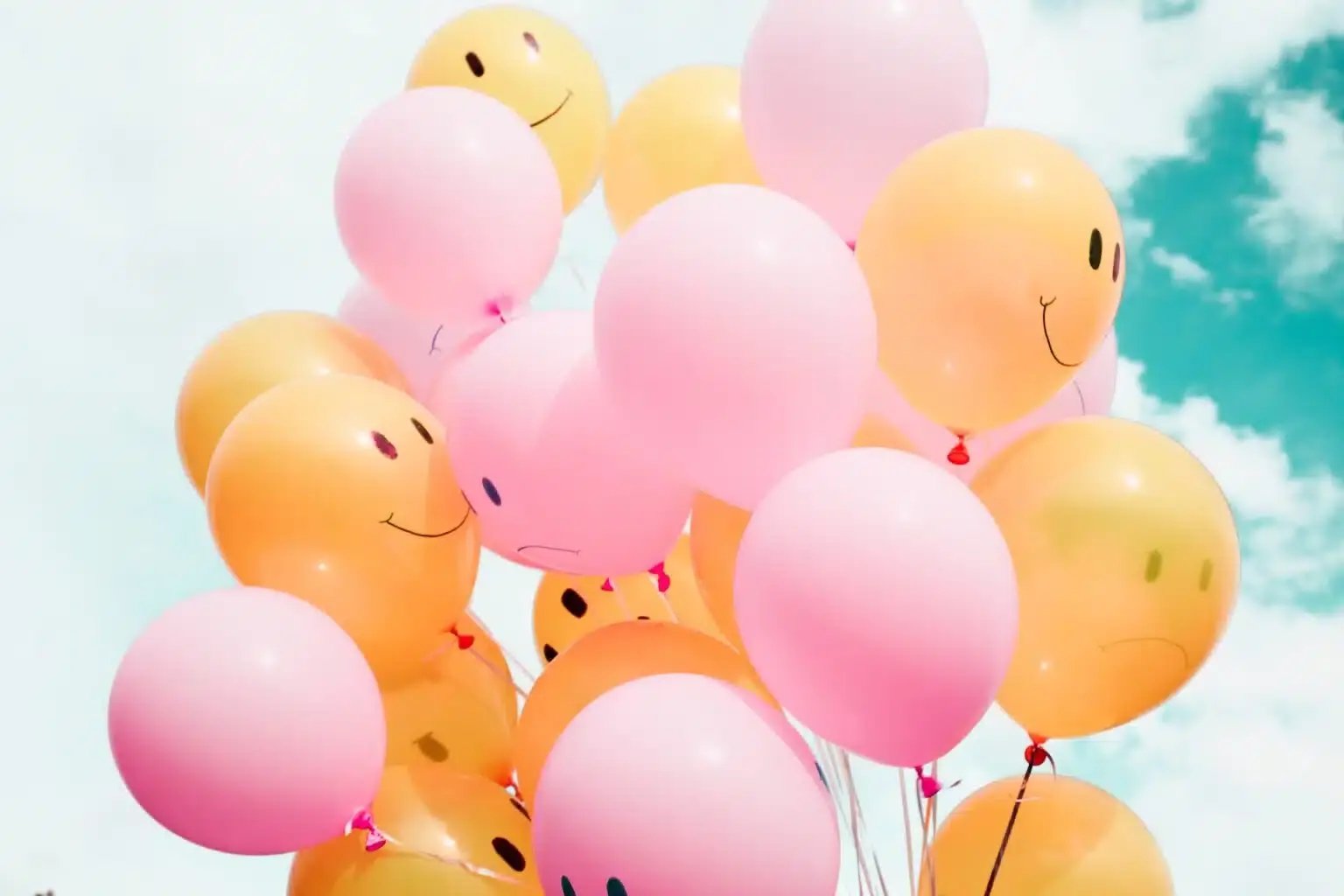 ballonnen-smiley-geel-roze